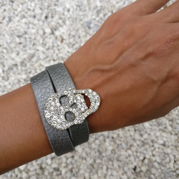 Jewelry - Gray bracelet with skull embellishments